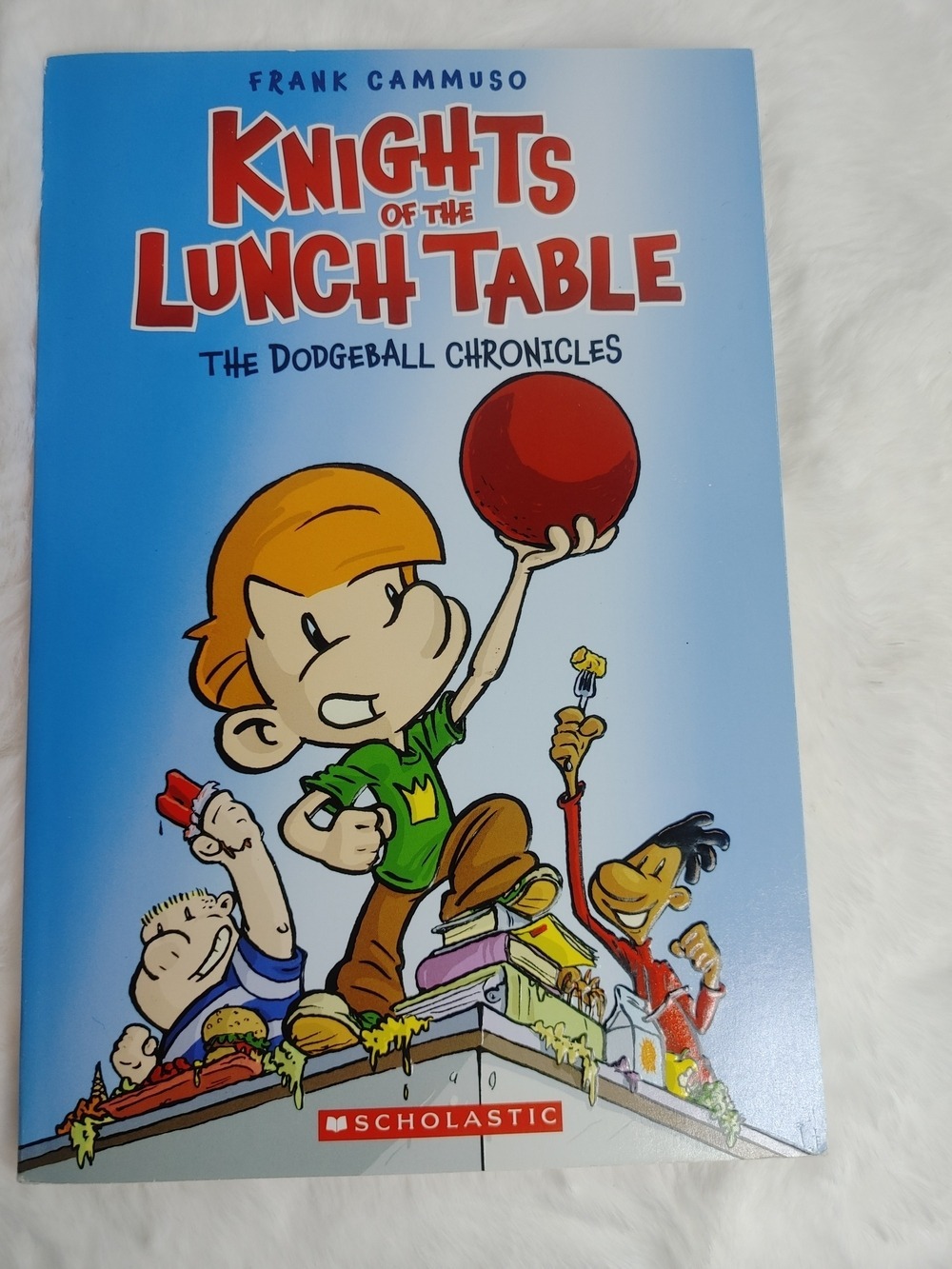 Scholastic Graphix Back Cover with Red, Green, Yellow Accents